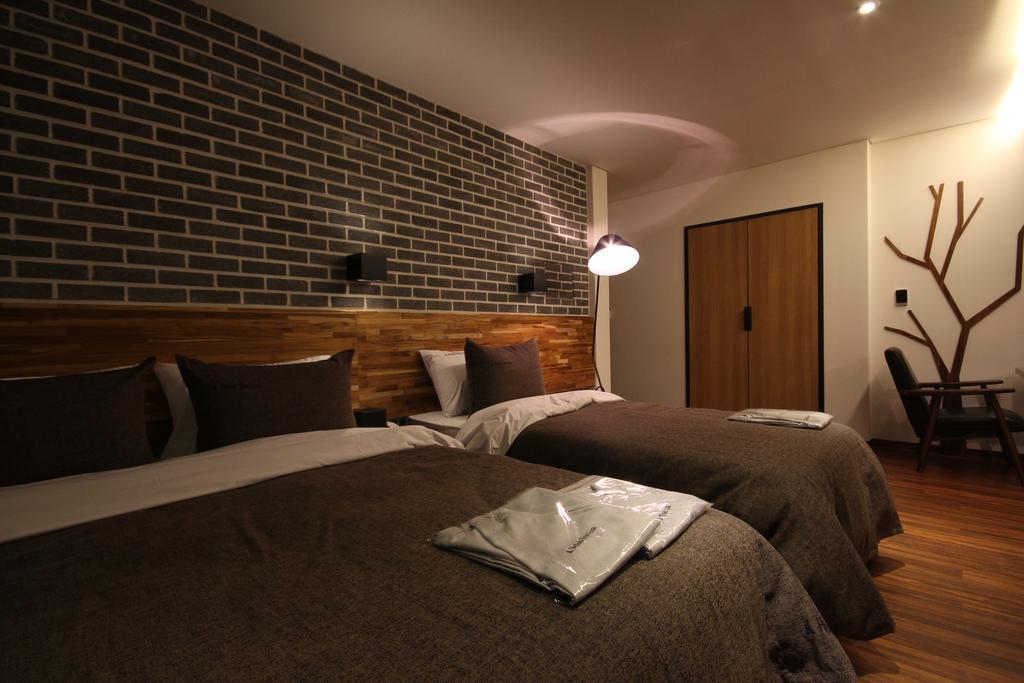 Hotel The Lua Пусан Номер фото